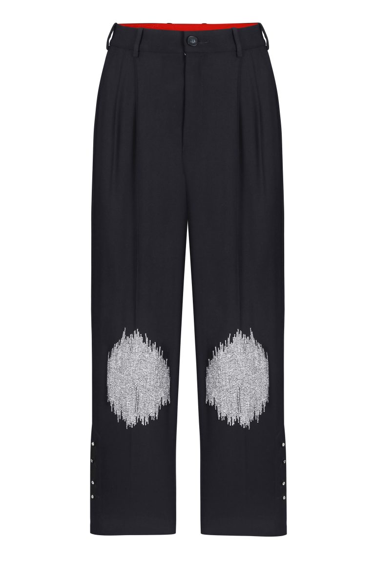 Trousers with handmade embroidery on the knees
